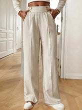 Cream-colored full size high-waisted wide-leg pants with a satin finish and matching belt loops suitable for machine wash cold