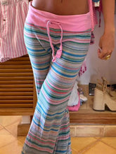 Pastel-striped drawstring striped pants with pink elastic waistband and matching drawstring for comfortable wear