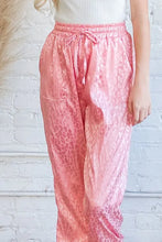 Pink leopard print satin joggers with drawstring waist machine wash cold for comfortable wear