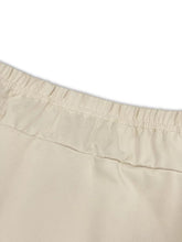 Beige cotton plus size relaxed fit casual pants with gathered elastic waistband for comfortable wear