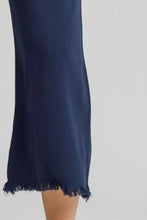 Navy blue umgee full size linen blend wide leg pants with elastic waistband and flowing frayed hemline skirt style