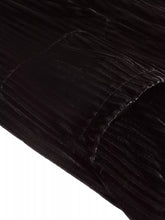 Black corduroy fabric with plush ribbed texture and subtle sheen designed for high-waisted wide-leg pants