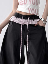 Black wide leg drawstring casual pants with ruffled striped waistband and matching drawstrings for comfortable wear