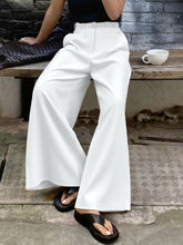 Plus size elastic white wide leg pants with high-waisted elastic waistband and smooth slightly glossy fabric