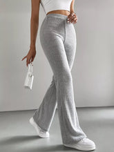 Gray ribbed knit high waist flare pants featuring a comfortable fit and stylish waist flare design