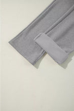 Gray heathered cotton drawstring loose fit pants with rolled cuffs for comfortable casual wear
