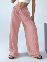 Full size red and white vertically striped wide leg pants with elastic drawstring waist for plus size comfort
