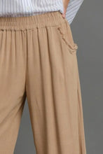 Beige umgee full size linen blend wide leg pants with elastic waistband and braided detail on side pocket