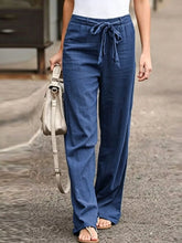 Blue linen tied wide leg pants with a drawstring waistband offering comfortable wide leg pants style