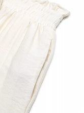 Off-white textured linen wide leg pants with gathered waistband and side seam detail for a perfect fit