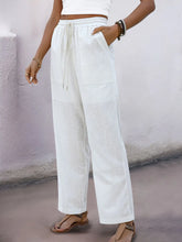 White linen perfee drawstring wide straight pants with drawstring waist and front pockets for casual wear