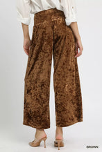Brown velvet wide-leg pants with a velvet smocked waistband for comfortable stylish wear by umgee