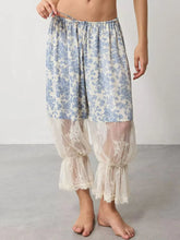 Blue and white floral lace patchwork pajama pants with lace trim at the cuffs for comfortable loungewear