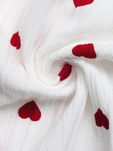 White gauzy heart print drawstring waist wide leg pants with scattered red heart motifs