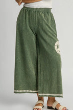 Umgee full size mineral wash olive green wide leg pants with white lace applique peace symbol patch and decorative hem trim