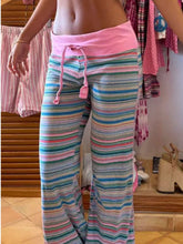 Pink and multicolored striped drawstring striped pants with wide-leg fit and adjustable waistband for casual wear