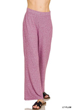 Light plum-colored zenana soft elastic waisted flare pants with wide legs and textured fabric for comfort