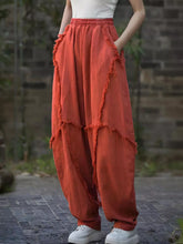 Rust-colored layered cotton frayed edge harem pants with elastic waistband for comfortable casual wear