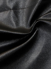 Black faux leather striped wide leg pants with smooth textured surface and subtle sheen suitable for tumble dry