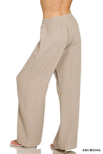 Ash mocha wide-leg pants with ribbed texture and elastic band made from double gauze elastic material