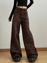 Brown leopard print wide leg high waist pants with flowy fabric suitable for stylish casual wear