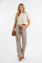 Beige and brown drawstring striped twill barrel pants featuring wide-leg design and vertical stripes