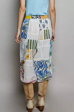 Pol printed patchwork wide leg pants with vibrant blue green and floral printed patchwork on white fabric panels
