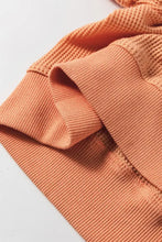 Orange ribbed v-neck long sleeve waffle knit top, slightly stretchy basic style