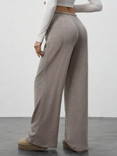 Beige ribbed corduroy relaxed fit wide leg pants designed for comfort and style in wide leg pants category