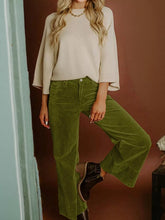 Olive green corduroy solid color high waist wide leg pants with flare design for a stylish solid color look