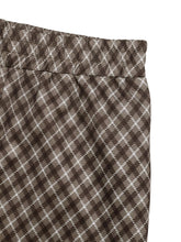 Brown and white plaid high-waisted wide leg pants with elastic waistband made from soft breathable material care instructions included