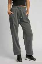Gray heathered umgee full size drawstring wide-leg pants with side pockets and a comfortable waistband