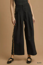 Black umgee front pleated wide-leg pants feature leopard print contrast trim side stripes and offer stylish comfort