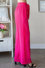 Bright pink Heimish full size tie pants with pleated wide legs and paperbag waistband plus size offer