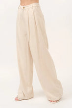 Beige high-rise wide leg linen blended pants with pleated front and gold-tone button closure