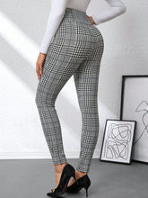 Black and white high waist plaid slim fit pants with houndstooth pattern for a stylish and comfortable look