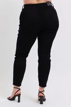 Black high-waisted judy blue plus size faux leather skinny pants with slim fit and ankle-length cut