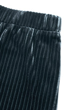Black high-waisted ribbed velvet flare pants with soft ribbed texture and elastic waistband in luxurious velvet material