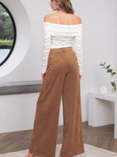 Brown suede high-waisted wide-leg pants with front pockets and care instructions for wide leg pants maintenance