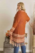 Rust long Aztec border cardigan with fringe hem for women