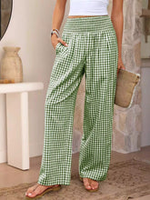 Green and white gingham high waisted wide leg pants with elastic waistband made from lightweight fabric