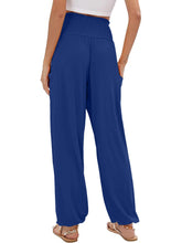 Royal blue full size smocked waist harem pants with wide legs relaxed flowing fabric and side pockets plus size