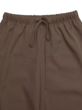 Brown wide leg drawstring pants with soft smooth fabric and elastic waistband for comfort and style