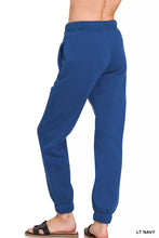 Blue fleece drawstring joggers by zenana with elastic waistband cuffs and pockets for comfortable casual wear