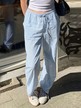 Light blue and white striped cotton drawstring wide leg pants with elastic waistband for comfortable wear