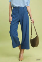 Blue umgee denim wide leg crop pants with front pockets and a straight leg cut in a culottes style