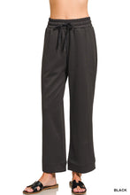 Black zenana scuba drawstring pants featuring wide-leg design elastic waistband and adjustable drawstring for comfort