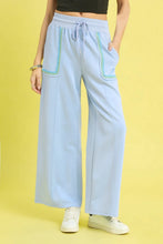 Light blue umgee drawstring wide leg sweatpants with scallop trim and embroidered side pockets