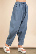 Blue high-waisted solid barrel comfy woven pants with elastic drawstring waistband and subtle paneling