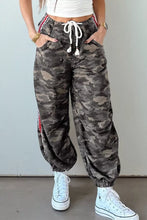 Camo print drawstring waist joggers in green with elastic cuffs and a comfortable fit for casual wear